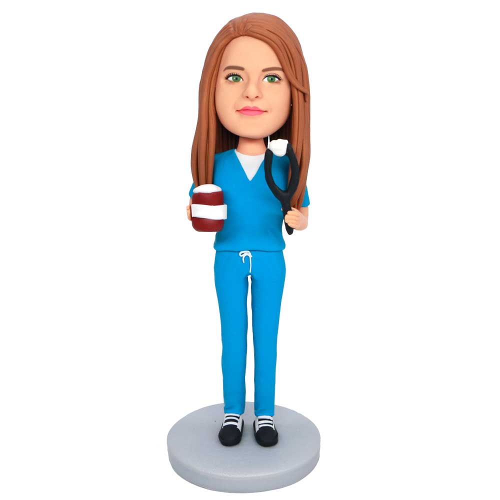 Custom Female Dentist Bobbleheads In Blue Uniform Holding Teeth